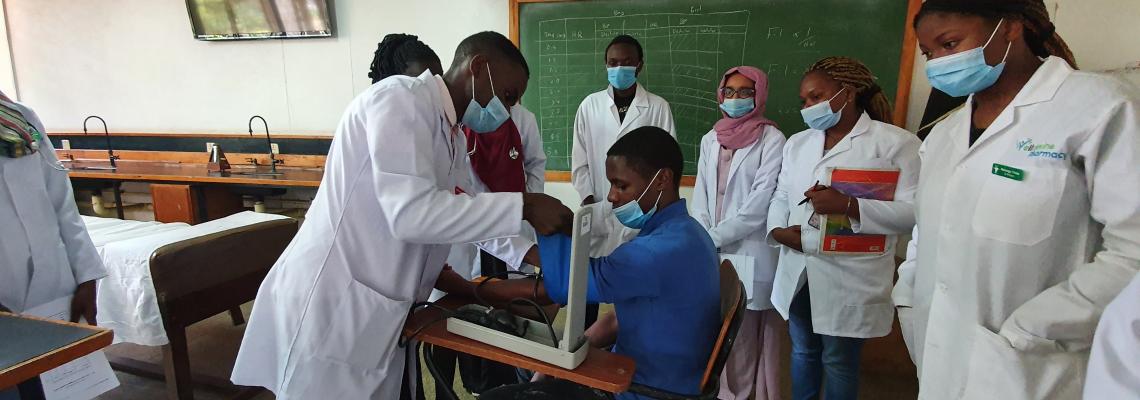 A Medical student in a Medical Physiology practical session testing for absorbance with the latest spectrophotometer equipment