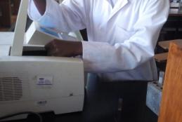 A Medical student Ms. Kerry Mwita in a Medical physiology practical session testing for absorbance with the latest spectrophotometer equipment